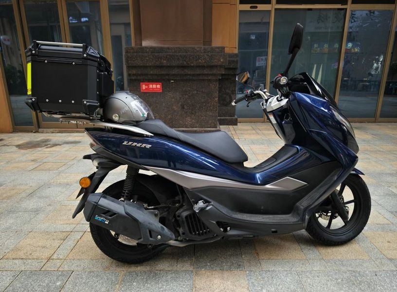 林风与他的摩托车uhr有着深厚的感情,他们一同经历了无数次的日出日落